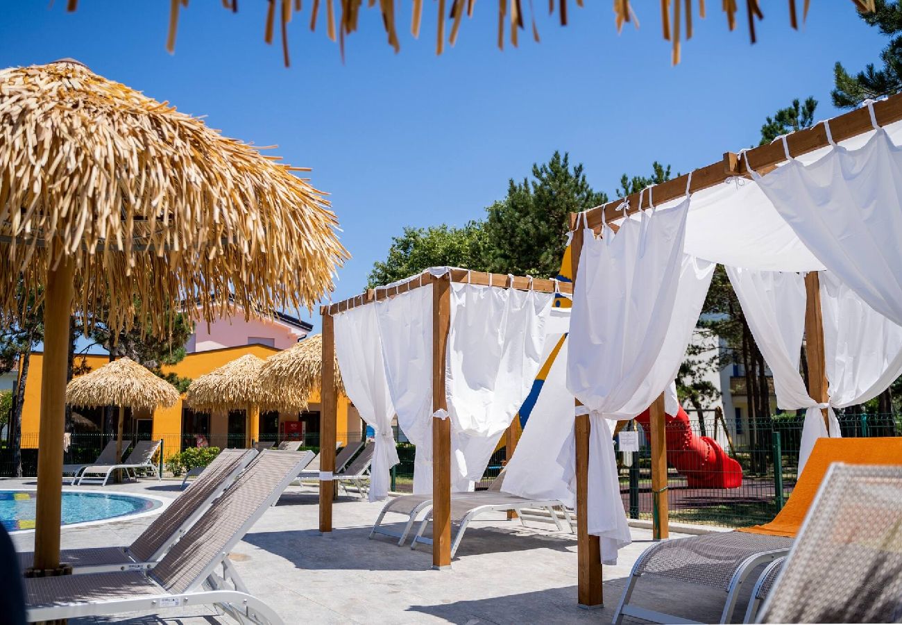 Appartamento a Bibione - Villetta su 2 piani + giardino e 1 camera da letto