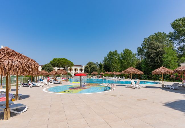 Appartamento a Bibione - CALYCANTHUS - Villetta su due piani con giardino e 2 camere (6 pax)