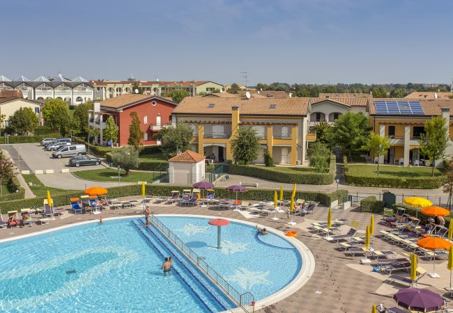 Appartamento a Caorle - CARPINI - Villetta su due piani con giardino e 1 camera da letto