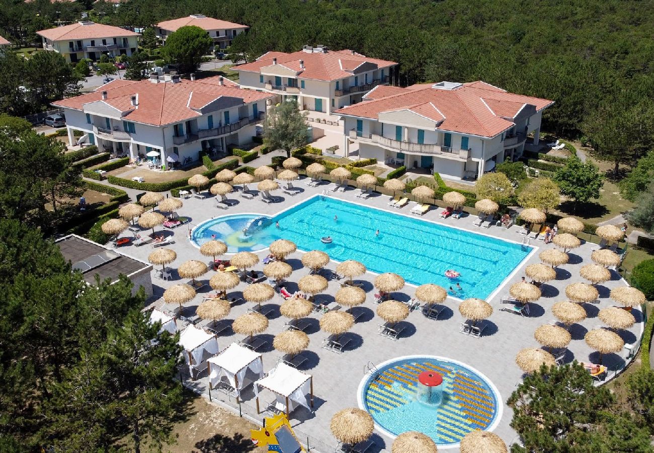 Ferienwohnung in Bibione - Wohnung im EG mit Garten und 1 Schlafzimmer